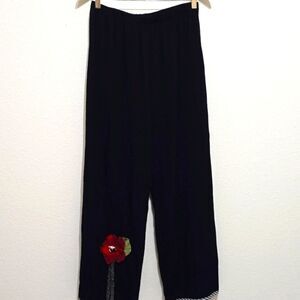 Classic Black Trousers with Red Circular Detail